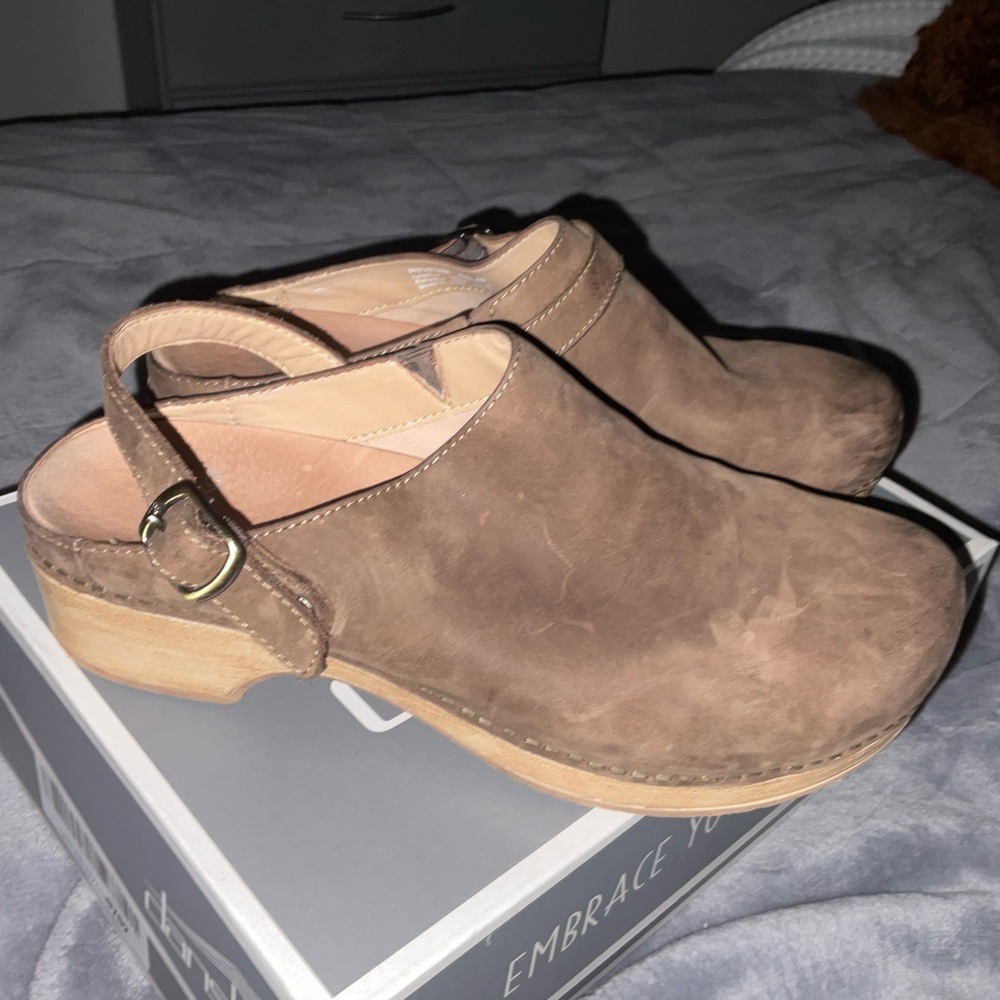 Dansko 
Brown Leather Clogs with Strap